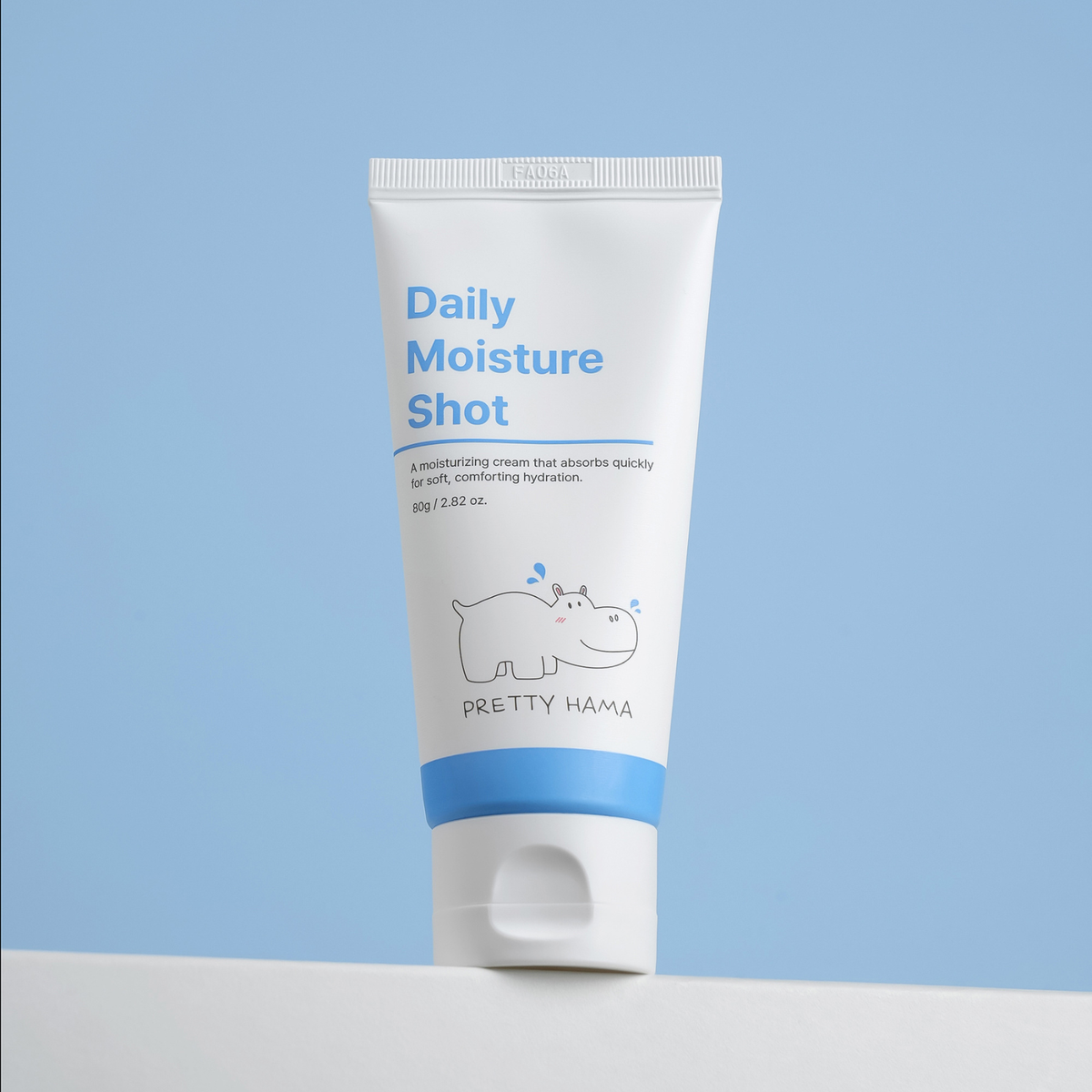 Front view of Pretty Hama Daily Moisture Shot 80g face moisturizer tube with hippo logo against a light blue background
