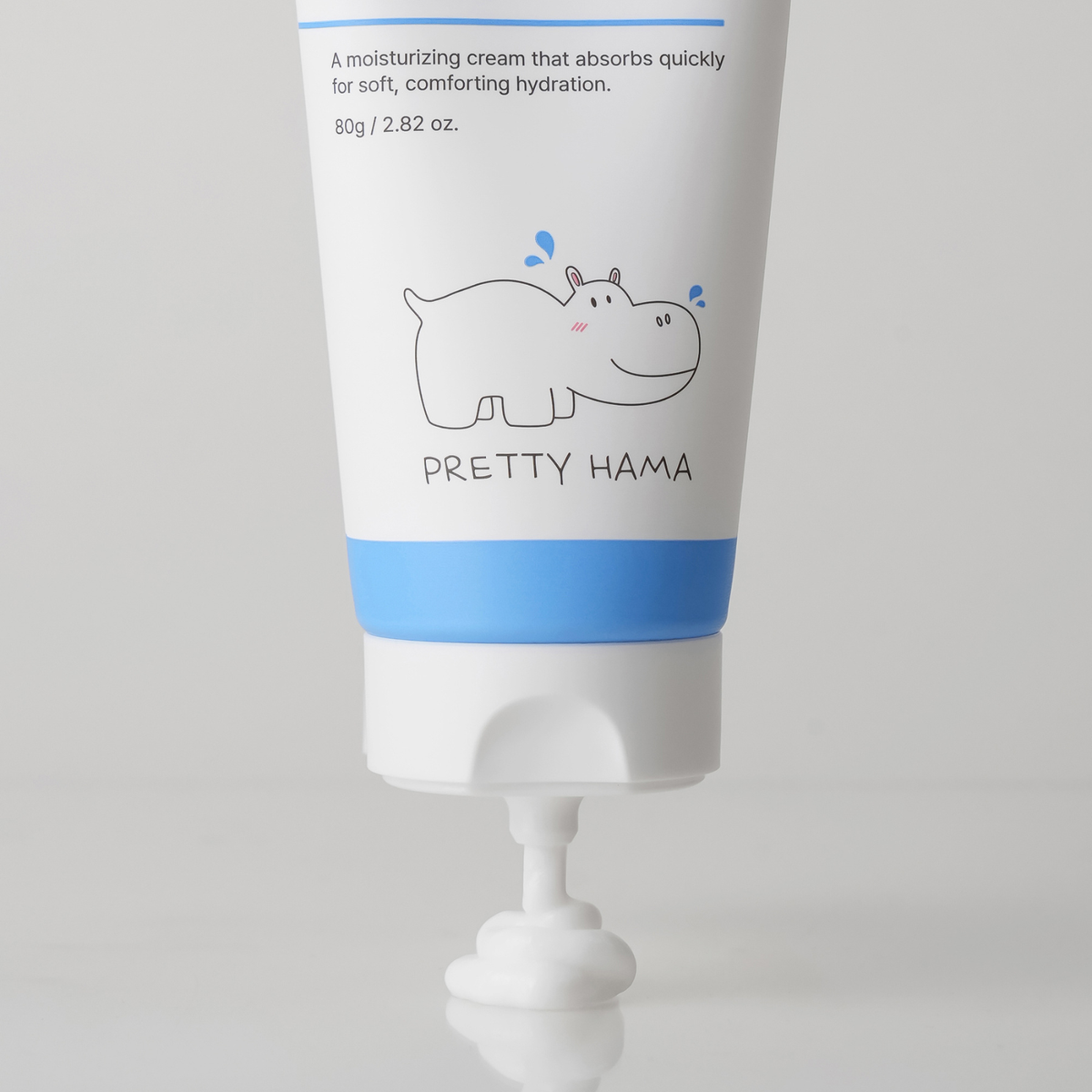 Close-up of Pretty Hama Daily Moisture Shot face moisturizer tube dispensing white cream