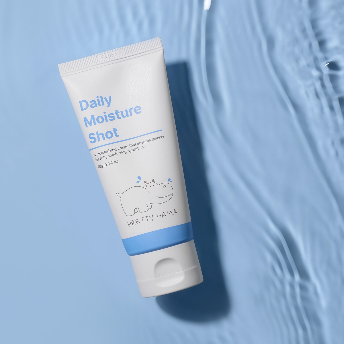 Pretty Hama Daily Moisture Shot 80g face moisturizer tube on a light blue water-inspired background